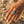 Load image into Gallery viewer, Hand wearing a silver ring on a pebbly surface
