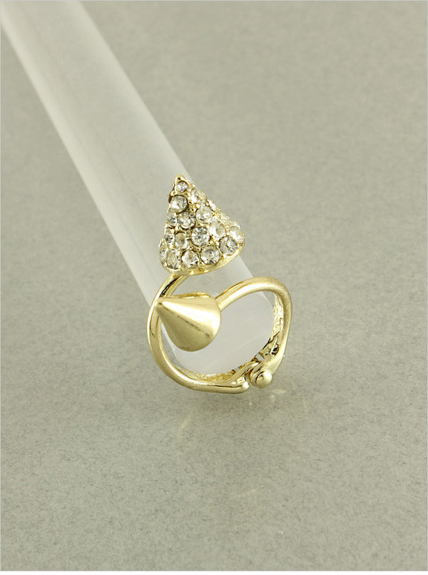 Gold ring with diamond accents on a light gray background