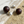Load image into Gallery viewer, Wooden sphere earrings with marble accents on a marble and sand surface
