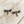 Load image into Gallery viewer, Silver dragonfly earrings on a wooden surface
