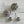 Load image into Gallery viewer, Silver wire ball earrings on a textured wooden surface
