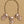 Load image into Gallery viewer, Decorative bracelet with floral designs on a dark surface
