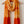 Load image into Gallery viewer, Orange and yellow tie-dye scarf on a wooden hanger against a white background
