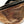 Load image into Gallery viewer, Brown leather fanny pack with a black zipper on a white background
