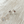 Load image into Gallery viewer, Flamingo earrings on a 'The One' branded card with 'Designed in U.S.A.' text, on a wooden surface.
