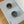 Load image into Gallery viewer, Gray bowls on a patterned mat with 'unikook' branding on a wooden floor.
