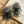 Load image into Gallery viewer, Black and silver beaded earrings on a textured surface
