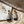 Load image into Gallery viewer, Tassel earrings on a textured surface with dried flowers
