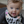 Load image into Gallery viewer, Baby wearing a bib with text about durability and absorbent layers
