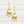 Load image into Gallery viewer, Gold earrings with yellow gemstones on a white background
