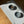 Load image into Gallery viewer, Two gray bowls on a patterned mat with 'uniklack' branding on a wooden floor.
