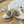 Load image into Gallery viewer, Silver earrings with gemstones on a sand and stone surface
