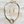 Load image into Gallery viewer, Gold necklace and earrings set on a wooden surface
