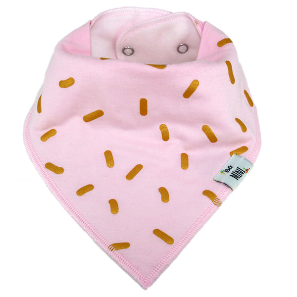 Pink baby bib with gold patterns on a white background