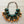Load image into Gallery viewer, Colorful beaded necklace with green, orange, and red beads on a white background
