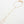 Load image into Gallery viewer, Gold necklace with small beads on a light gray background
