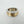 Load image into Gallery viewer, Silver and gold ring on a light gray background
