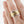 Load image into Gallery viewer, Gold and silver ring on a finger against a white background

