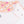 Load image into Gallery viewer, Baby bib with geometric pattern and white shirt with pink trim on a white background

