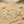 Load image into Gallery viewer, Silver bracelet with starfish designs on a sandy surface
