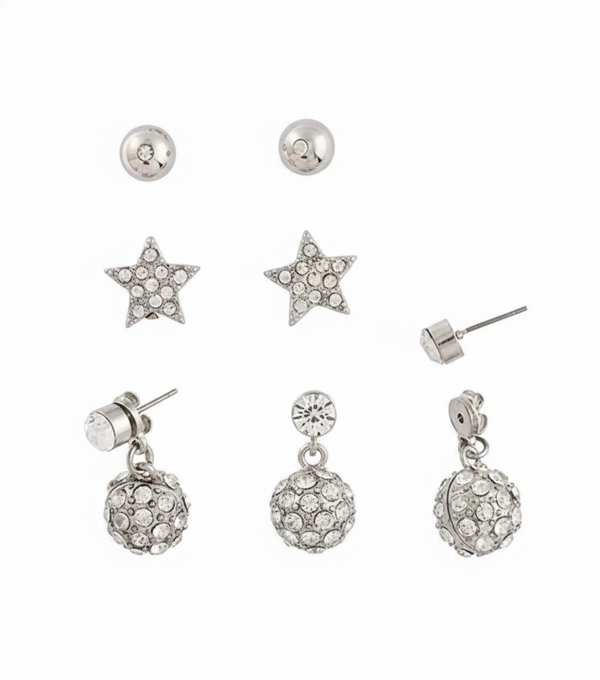 Set of silver earrings including star-shaped, ball, and drop designs on a white background