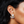 Load image into Gallery viewer, Pearl earring worn by a person with dark hair
