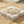 Load image into Gallery viewer, Silver bracelet on a stone with sand in the background
