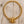 Load image into Gallery viewer, Gold spider necklace on pale barn wood
