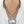 Load image into Gallery viewer, Mannequin wearing a white shirt with multiple silver necklaces, including a prominent round pendant.
