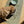 Load image into Gallery viewer, Dog eating from a bowl on a 'uniklook' branded mat with water bowl in the background.
