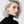 Load image into Gallery viewer, Woman with silver hair wearing a black turtleneck and pearl earrings on a white background
