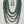 Load image into Gallery viewer, Long turquoise patina multi-strand necklace with matching earrings on display bust
