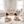 Load image into Gallery viewer, Two children playing with wooden blocks in a bright, minimalistic playroom.
