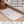 Load image into Gallery viewer, Waterproof Pet Feeding Mat — Pink Terrazzo Vegan Leather | 28 x 16.5 in
