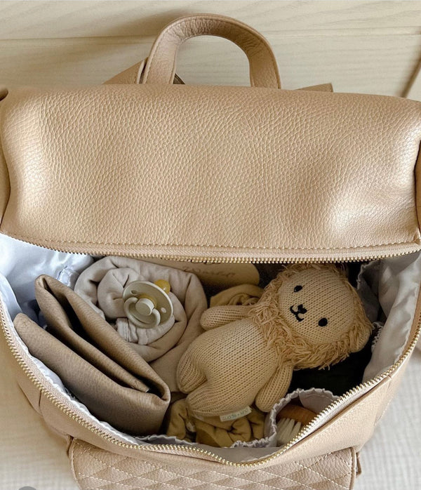 Tan+ vegan leather fold in a diaper bag