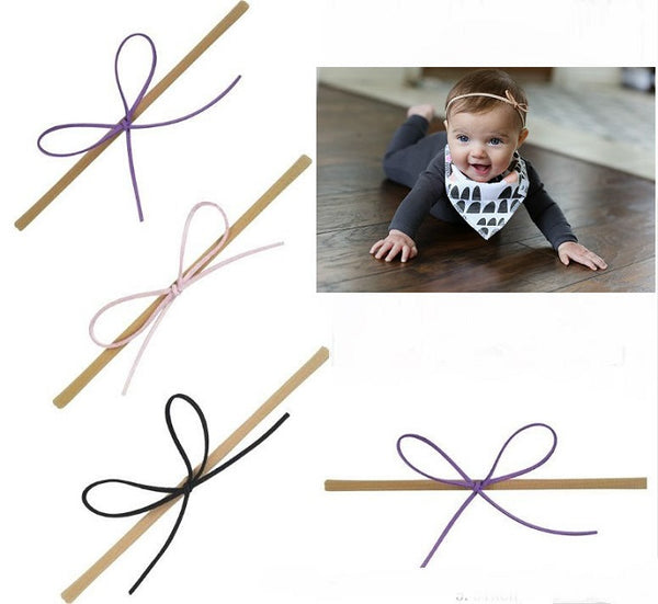 Sleek suede knot bow